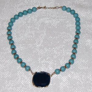 ER Turquoise Beads With Navy Square Medallion W/Gold Colored Frame 10" Long